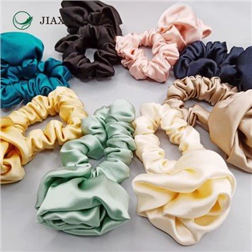 Scrunchies de pelo de seda rosa